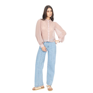 Blusa semitransparente de puntos con cuello alto