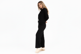 Suéter y pantalón negro vista 1